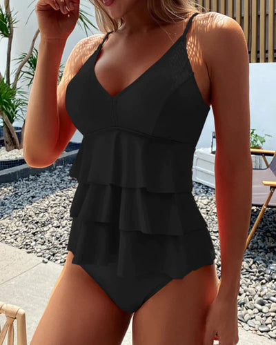 Effen tankini met ruches en split
